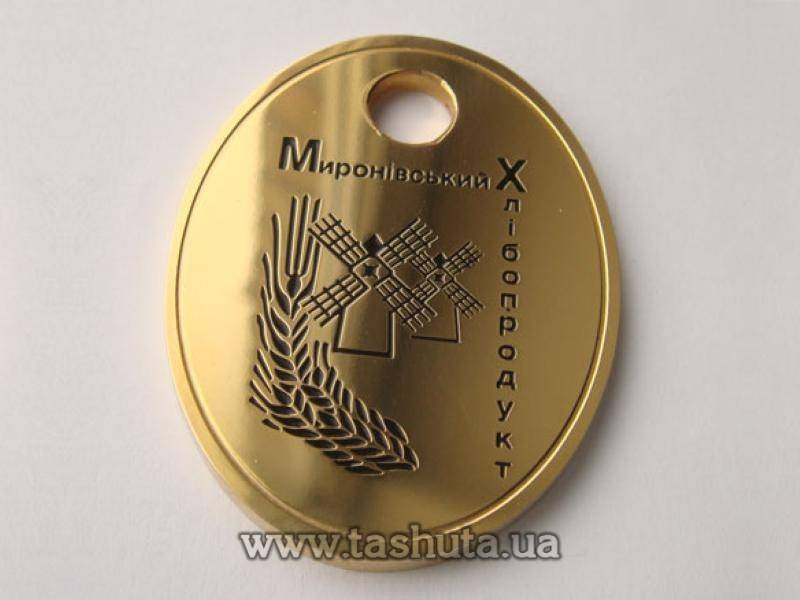 Овальный металлический номерок с покрытием золото 36х29 мм односторонний