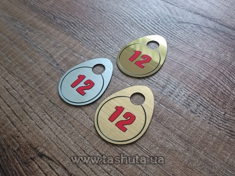 Numerek plastikowy do szatni 50x65 mm, dwustronny